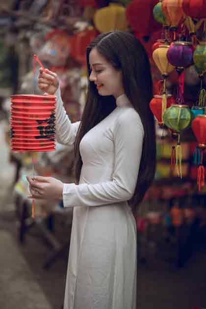 A Chinese Woman Holding a Lantern