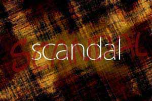 A vandalized canvas with the word “scandal” written in it